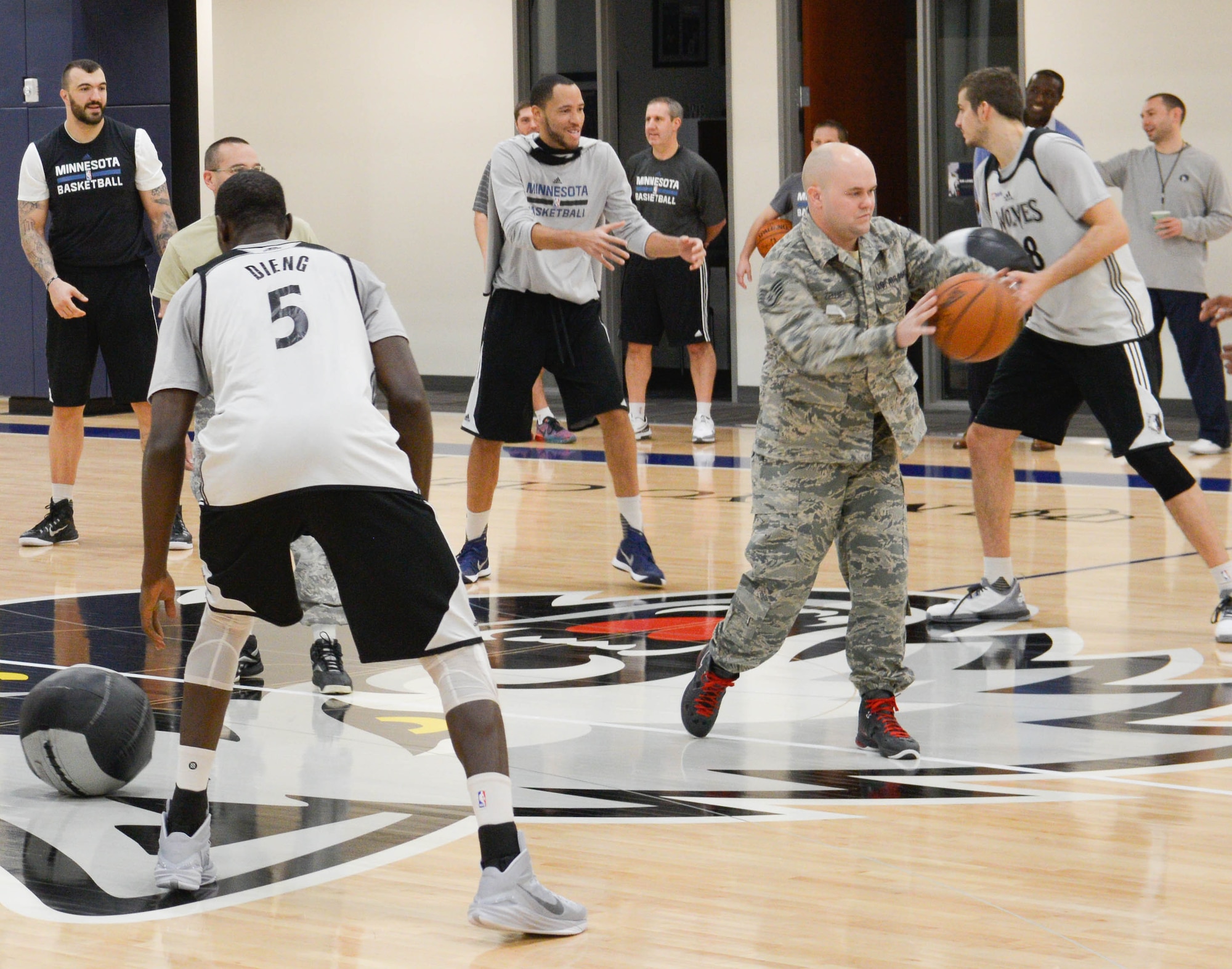 Staff Sgt. Daniel Zellmer, 934th Maintenance Squadron, passes the ball during a speed contest with the Minnesota Timberwolves. (Air Force Photo/Capt. William-Joseph Mojica)