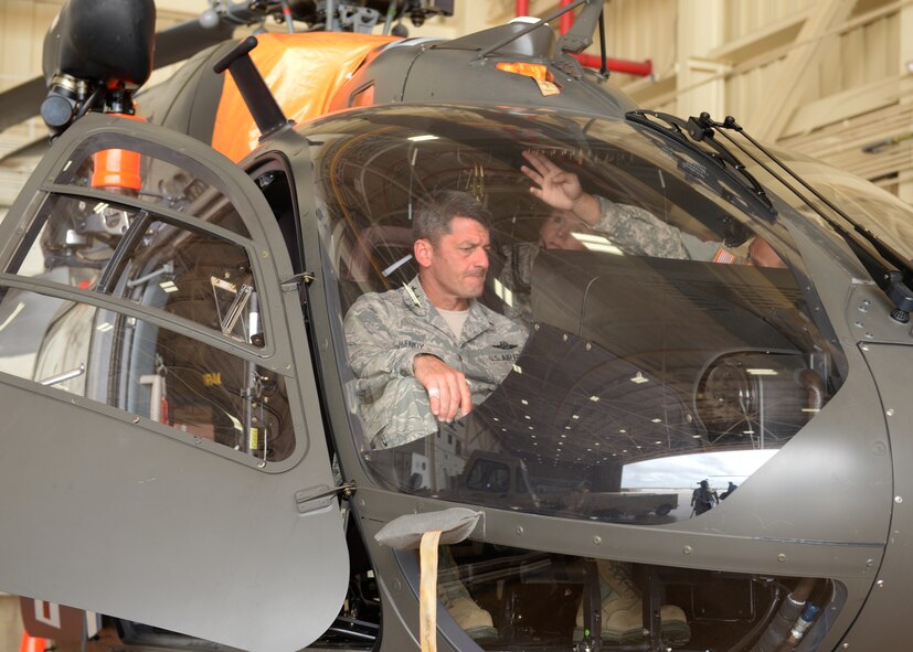 Lt. Gen. Russell Handy, 11th Air Force commander, sits in an Army National Guard Lakota helicopter while on a tour at Helicopter Sea Combat Squadron 25 Nov. 23, 2015, at Andersen Air Force Base, Guam. Handy visited Guam to interact with Airmen and leaders from Andersen AFB, Naval Base Guam, and Joint Region Marianas. (U.S. Air Force photo by Senior Airman Cierra Presentado/Released)