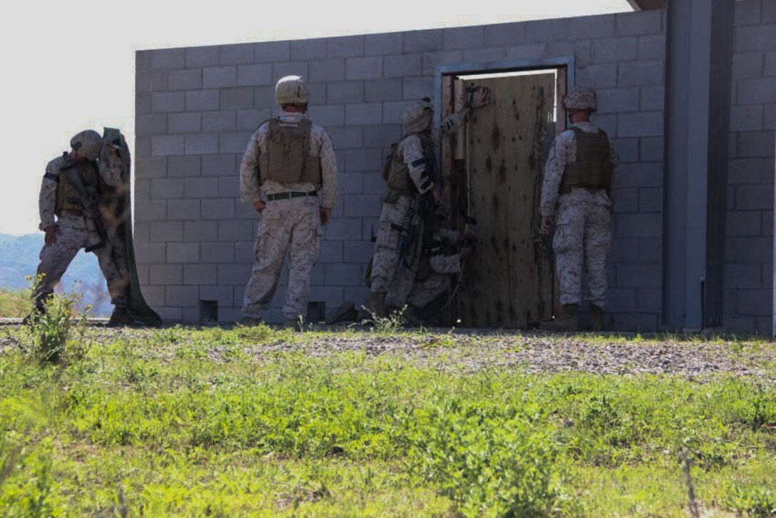 Lance Cpl. Taylor Drake, a combat engineer with 1st Combat Engineer Battalion, 1st Marine Division, is the lead on placing the charges as well as the second Marine to enter the building to clear rooms. Drake, a Phoenix native, conducted breaching and room clearing drills with 2nd Platoon, Bravo Company, 1st CEB Marines, at Marine Corps Base Camp Pendleton, California, Oct. 8, 2015.