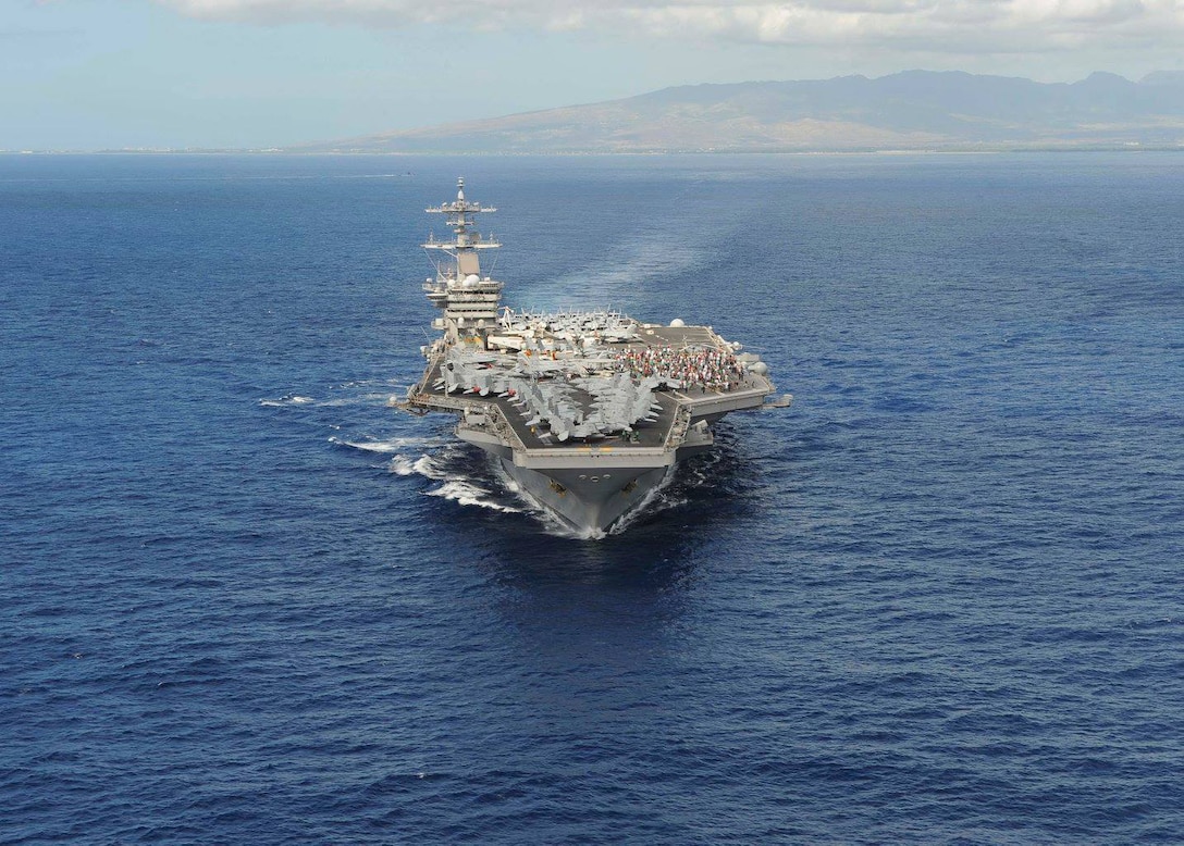 The USS Theodore Roosevelt (CVN 71) departs from Joint Base Pearl Harbor-Hickam, Hawaii on its way to its new homeport in San Diego. The aircraft carrier received a fresh fruits and vegetables delivery Nov. 15, DLA Troop Support Pacific’s first delivery through a new long-term contract.