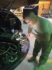 Staff Sgt. Frank Schatzman, of the 1108th Theater Aviation Sustainment Maintenance Group (TASMG), replaces safety wire on APX-123 coaxial connectors during a preventative maintenance inspection at Camp Arifjan, Kuwait on Sept. 29, 2015. The Mississippi Army National Guard aviation maintenance unit successfully completed a Phase Maintenance Inspection Cycle-1 (PMI) at Camp Arifjan, Kuwait, on Sept. 28 and successfully returned the completed aircraft to the 1/137th General Support Aviation Battalion (GSAB) at Camp Buehring, Kuwait, two weeks later. 