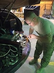 Staff Sgt. Frank Schatzman, of the 1108th Theater Aviation Sustainment Maintenance Group (TASMG), replaces safety wire on APX-123 coaxial connectors during a preventative maintenance inspection at Camp Arifjan, Kuwait on Sept. 29, 2015. The Mississippi Army National Guard aviation maintenance unit successfully completed a Phase Maintenance Inspection Cycle-1 (PMI) at Camp Arifjan, Kuwait, on Sept. 28 and successfully returned the completed aircraft to the 1/137th General Support Aviation Battalion (GSAB) at Camp Buehring, Kuwait, two weeks later.