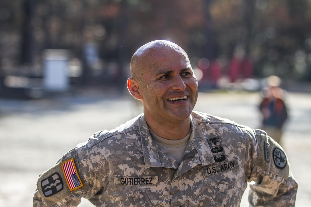 Army 1st Sgt. Ricardo Gutierrez takes a breather after completing the confidence course during the assessment phase of the Best Ranger Competition on Fort Jackson, S.C., Nov. 24, 2015. Gutierrez is one of three Fort Jackson soldiers fighting for a position on a two-soldier team that will represent the post during the 33rd annual competition on Fort Benning, Ga., in April 2016. U.S. Army photo by Sgt. 1st Class Brian Hamilton
