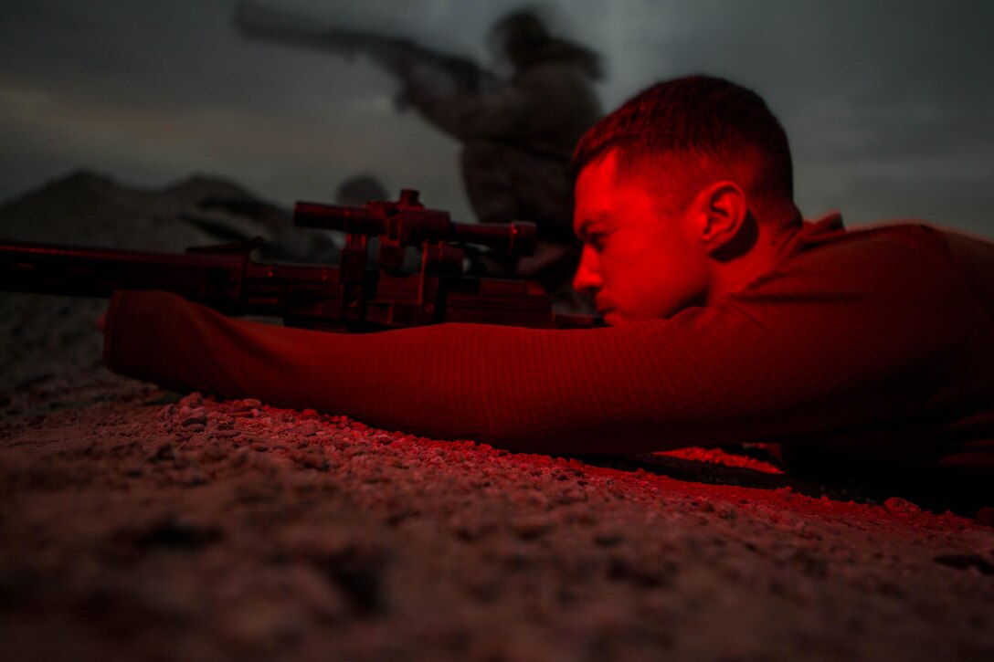 U.S. Marine Corps Cpl. Taylor Giffard role-plays as an opposition force member during a mission readiness exercise for the 1st Battalion, 7th Marine Regiment at an undisclosed location in Southwest Asia, Nov. 24, 2015. Giffard is a ground signals operator with Special Purpose Marine Air-Ground Task Force-Crisis Response-Central Command. U.S. Marine Corps photo by Sgt. Owen Kimbrel