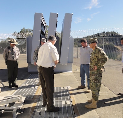 Brig Gen. Mark Toy, commander of the U.S. Army Corps of Engineers South Pacific Division, inspects operations at Lake Sonoma’s Warm Springs Dam, north of San Francisco. Toy discussed dam operations to reduce flood risk and protect people downstream as California enters a rainy season expected to be dominated by an El Nino weather pattern.