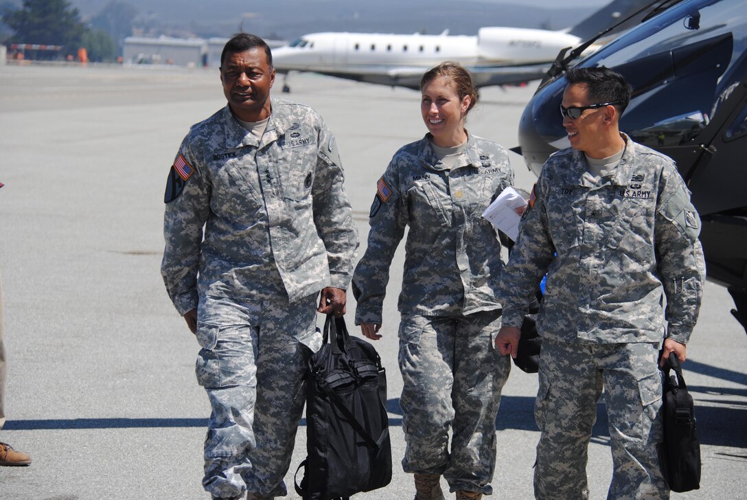 Lt. Gen. Thomas P. Bostick, left, commanding general and chief of engineers, U.S. Army Corps of Engineers, arrives at Monterey Airport prior to taking a tour of the Presidio of Monterey, one of several projects he visited while in the San Francisco Bay Area.  