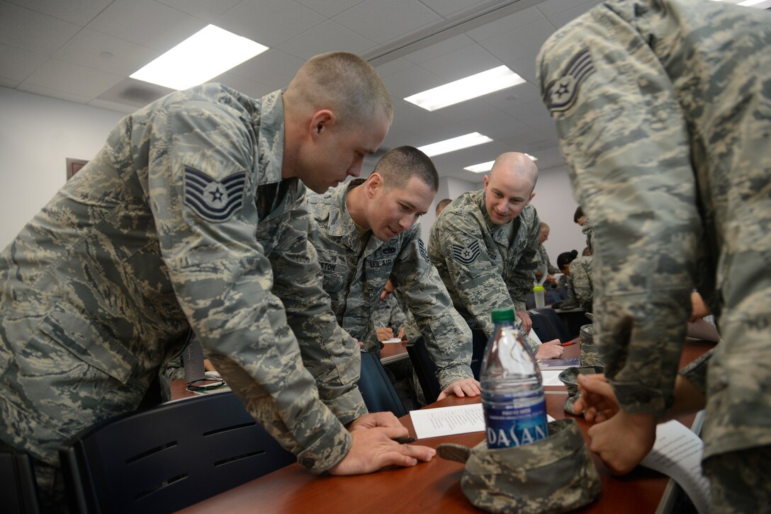 Luke Thunderbolts look for common ground with other members during the ice breaker at the Lightning Leadership Gold Course at Luke Air Force Base, Ariz., Nov. 19, 2015. With a variety of Thunderbolts coming from across base, the course was focused on connecting with one another and becoming better leaders. (U.S. Air Force photo by Senior Airman Devante Williams)