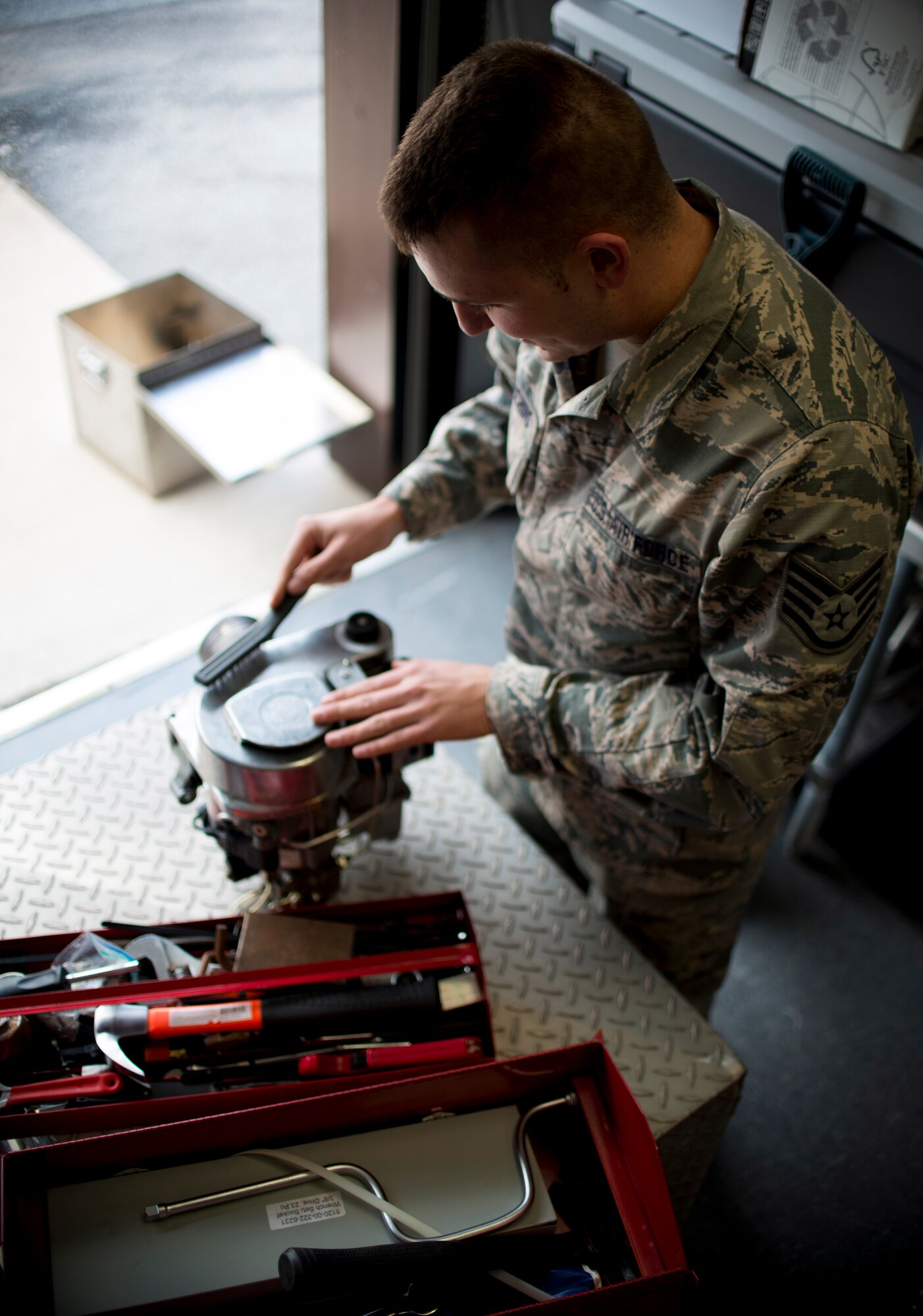 Staff Sgt. Christopher Sambuchino, 914th Force Support Squadron, services a Bavington Burner, used for heating food and water out in the field. Part of Sambuchino's responsibilities as a member of the 914 FSS is maintaining equipment to ensure mission readiness. (U.S. Air Force photo by Tech Sgt. Stephanie Sawyer)