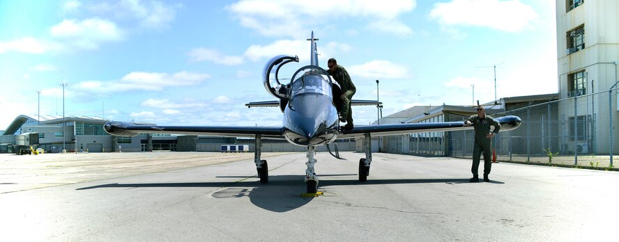 An L-39 Albatross Jet Trainer, piloted by Mark “Crunchy” Burgess, sits on the flight line at Niagara Falls International Air Port, July 15, 2015. “Crunchy” is providing incentive flights for wounded warriors as part of the Thunder of Niagara air show, Niagara Air Reserve Station, N.Y. (U.S. Air Force photo by Tech. Sgt. Stephanie Sawyer)