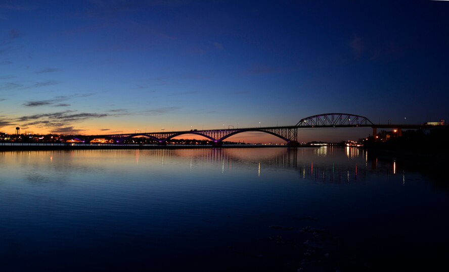 The Peace Bridge, an international bridge between Canada and the United States, displays purple lights as part of the Purple Up! campaign to show support and recognize the sacrifices and strength of military children, April 15, 2015. (U.S. Air Force photo by Tech. Sgt. Stephanie Sawyer)