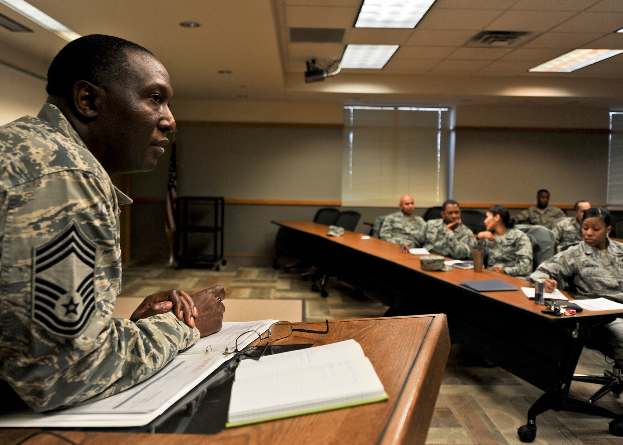Chief Master Sgt. Freddie Dorsey, 28th Logistics Readiness Squadron superintendent, listens to comments about diversity awareness from an Airman during a Diversity Council meeting at Ellsworth Air Force Base, S.D., Nov. 19, 2015. During the meeting, people from a wide range of backgrounds discussed steps on how best to increase diversity awareness on base. (U.S. Air Force photo by Airman Sadie Colbert/Released)