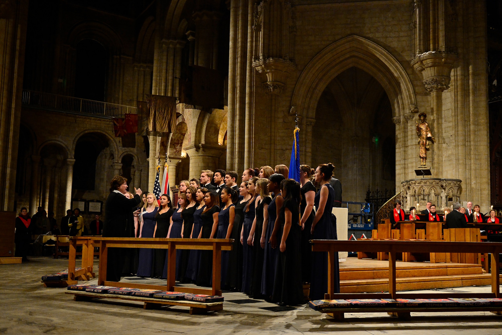 The Lakenheath High School choir sings during a Thanksgiving Eve Service at Ely Cathedral in Ely, England, Nov. 25, 2015. The 29th Annual Thanksgiving Service gave U.S. service members in England an opportunity to enjoy an American holiday service within the British community. (U.S. Air Force photo by Airman 1st Class Erin R. Babis/Released)
