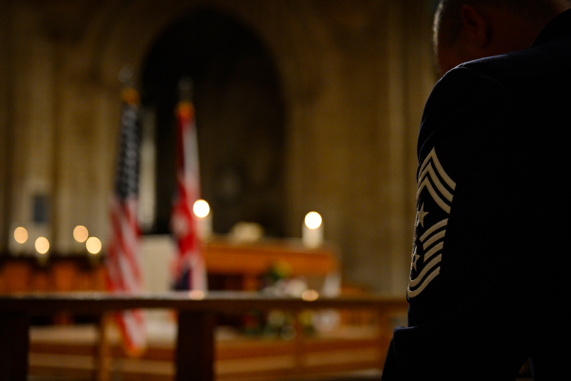 American service members, their families and other employees of Royal Air Forces Lakenheath, Feltwell and Mildenhall bow their heads in prayer during a Thanksgiving Eve Service at Ely Cathedral in Ely, England, Nov. 25, 2015. The 29th Annual Thanksgiving Service gave U.S. service members in England an opportunity to enjoy an American holiday service within the British community. (U.S. Air Force photo by Airman 1st Class Erin R. Babis/Released)