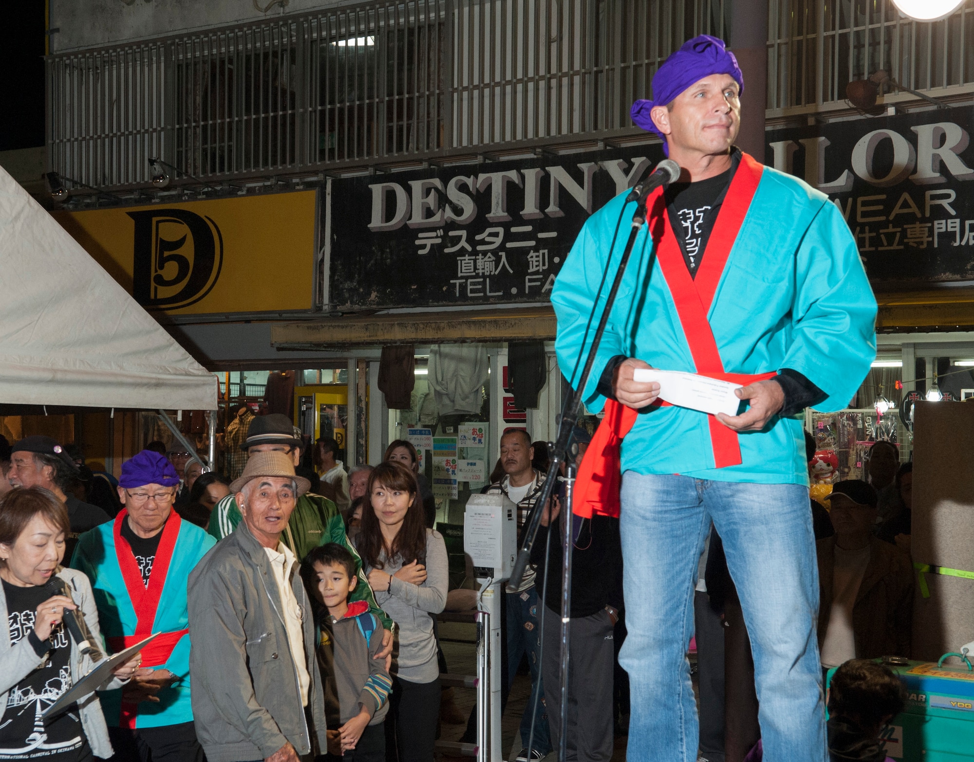 U.S. Air Force Brig. Gen. Barry Cornish, 18th Wing commander, addresses the crowd at the Okinawa International Carnival, Nov. 28, 2015. The annual carnival is an opportunity to celebrate more than two decades of friendship between Okinawa and Team Kadena. (U.S. Air Force photo by Master Sgt. Jason W. Edwards)