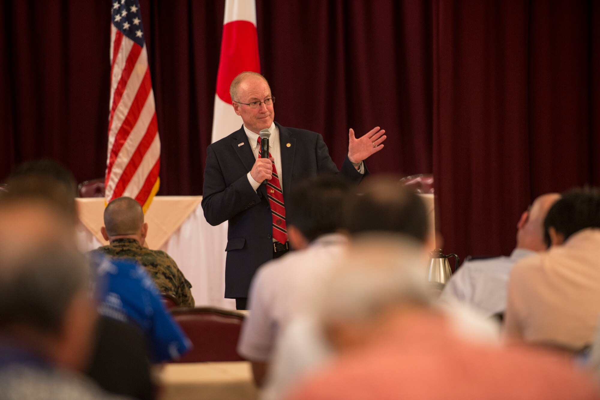 Retired U.S. Army Brig. Gen. Joseph Schroedel, Society of American Military Engineers executive director, speaks to attendees of the SAME Japan Post energy workshop, Nov. 18, 2015, at Kadena Air Base, Japan. Members of SAME and the Okinawan provincial government discussed energy solutions, goals and common interests. (U.S. Air Force photo by Senior Airman Omari Bernard)