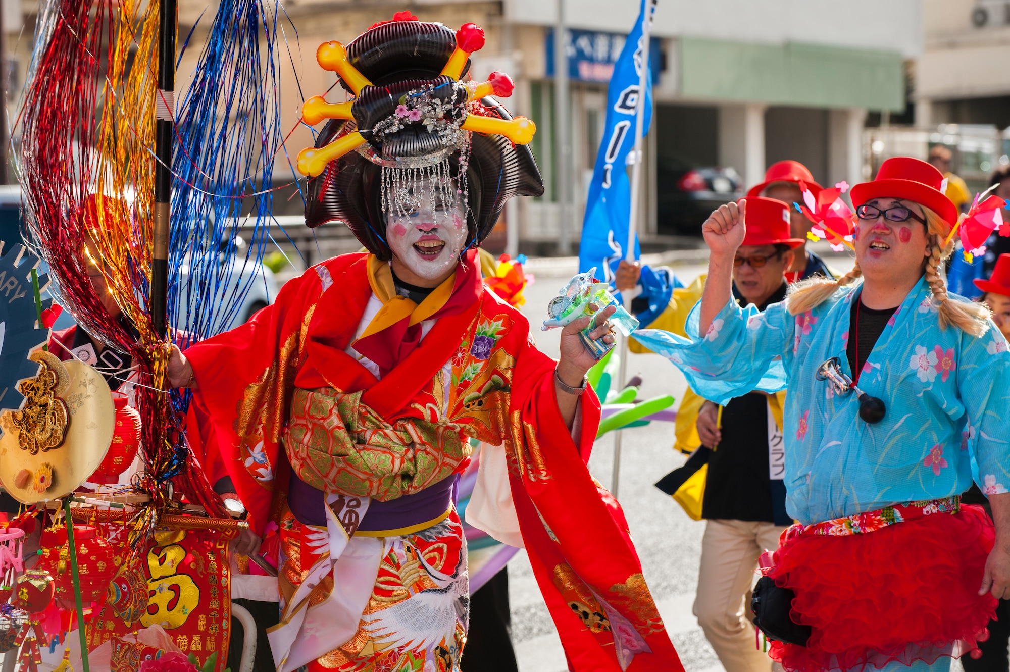 Okinawans march in the Okinawa City International parade Nov. 28, 2015, in Okinawa City, Japan. Approximately 25,000 people participated in this year’s events, highlighting Okinawa City’s international culture. (U.S. Air Force photo by Airman 1st Class Nicholas Emerick)