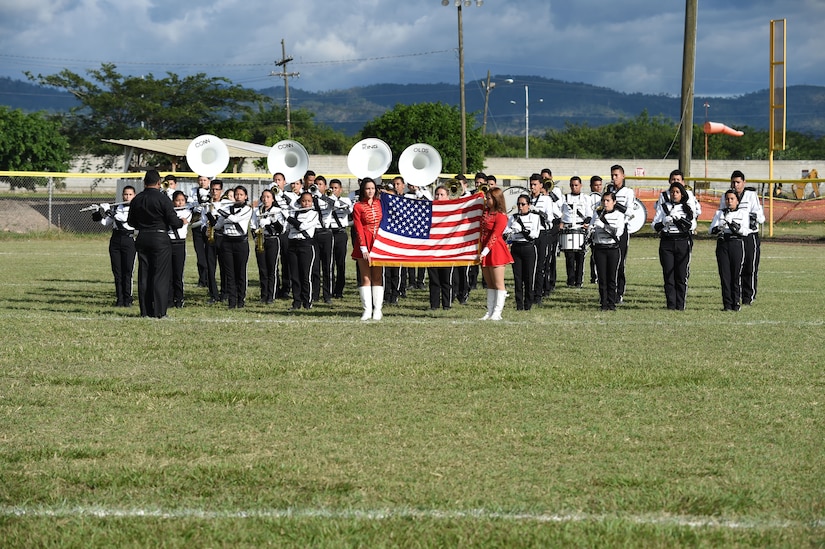 A local high school band performs during the annual Turkey Bowl, Army vs. Air Force, at Soto Cano Air Base, Honduras, Nov. 25, 2015. (U.S. Air Force photo by Martin Chahin/Released)