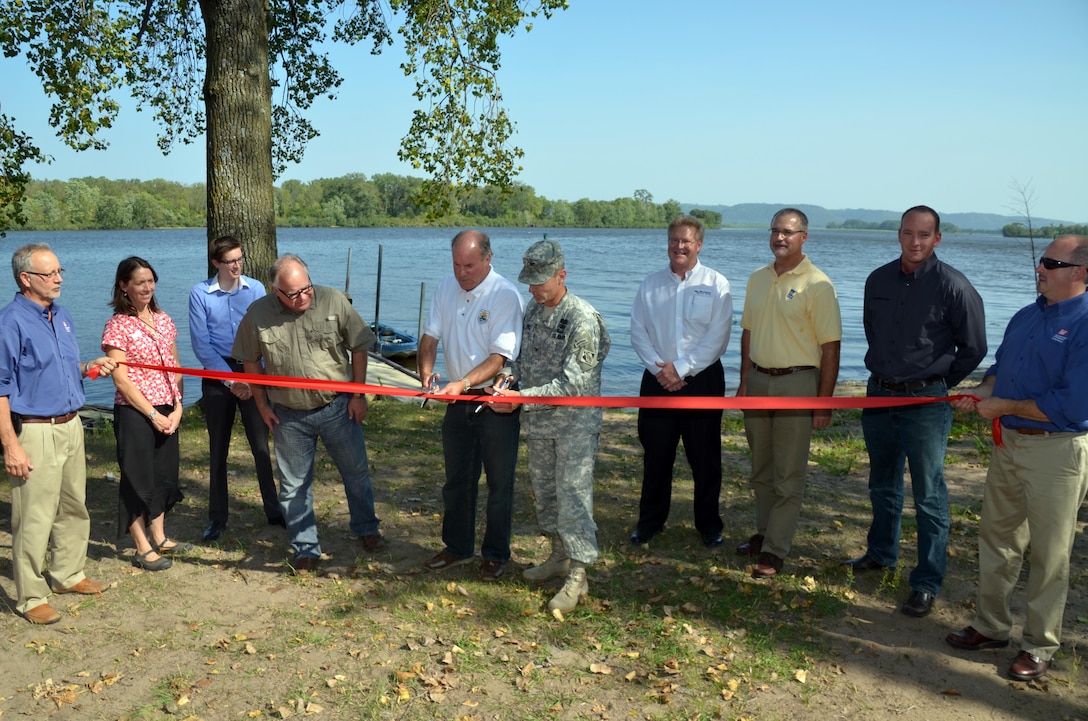 District staff gathered near Brownsville, Minn., Aug. 30, to highlight and dedicate the completion of a 3,000-acre environmental project along the Mississippi River in Pool 8. Completed as a cooperative effort among the U.S. Army Corps of Engineers, the U.S. Fish and Wildlife Service, the Wisconsin and Minnesota Departments of Natural Resources and the public; the Pool 8 project is part of the Upper Mississippi River Restoration - Environmental Management Program.