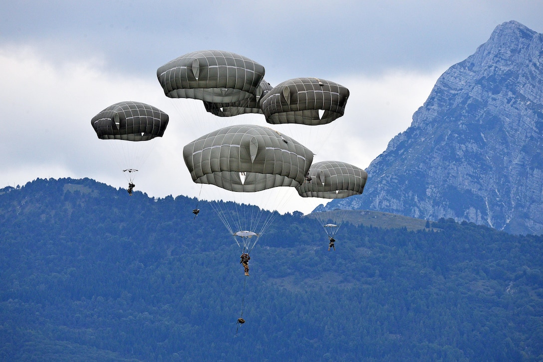 U.S. Army paratroopers conduct an airborne operation from a CH-47 Chinook helicopter over Juliet drop zone in Pordenone, Italy, Sept. 30, 2015. The paratroopers are assigned to the 173rd Brigade Support Battalion, 173rd Airborne Brigade. U.S. Army photo by Paolo Bovo