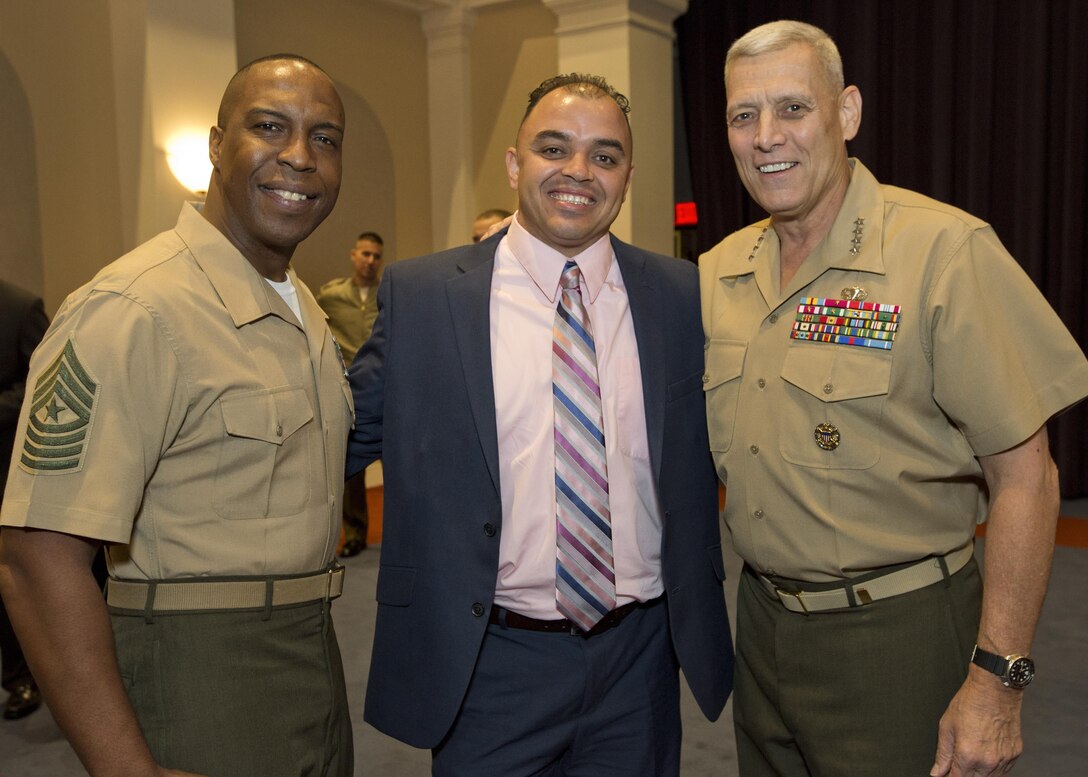 The Assistant Commandant of the U.S. Marine Corps, Gen. John M. Paxton, Jr., right, poses for a photo after the Marine Corps Institute (MCI) Sundown/Deactivation Ceremony at Marine Barracks Washington, Washington, D.C., Oct. 1, 2015. MCI has been providing the Marine Corps with knowledge and expertise since 1920. (U.S. Marine Corps photo by Sgt. Tia Dufour/Released)