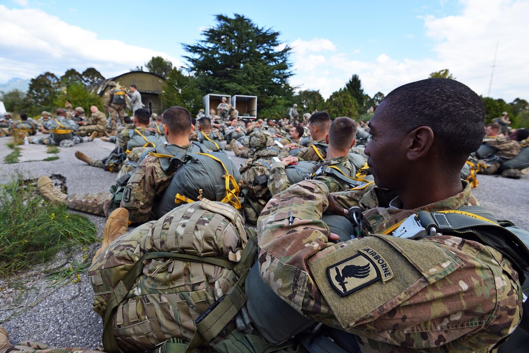 Paratroopers prepare to conduct an airborne operation from a U.S. Army CH-47 Chinook helicopter at Juliet drop zone in Pordenone, Italy, Sept. 30, 2015. U.S. Army photo by Paolo Bovo