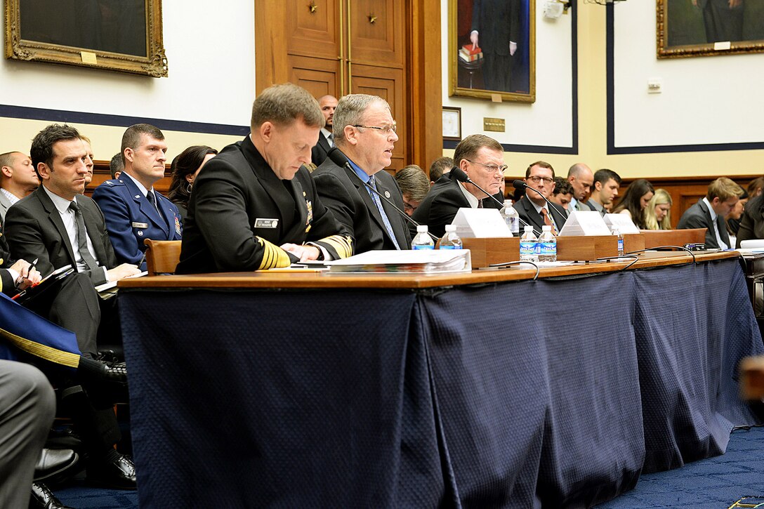 Deputy Defense Secretary Bob Work, center, testifies on implementing the Defense Department's cyber strategy with Navy Adm. Michael S. Rogers, left, commander of U.S. Cyber Command and director of the National Security Agency, and Terry Halvorsen, the department's acting chief information officer, before the House Armed Services Committee in Washington, D.C., Sept. 30, 2015. DoD photo by U.S. Army Sgt. 1st Class Clydell Kinchen