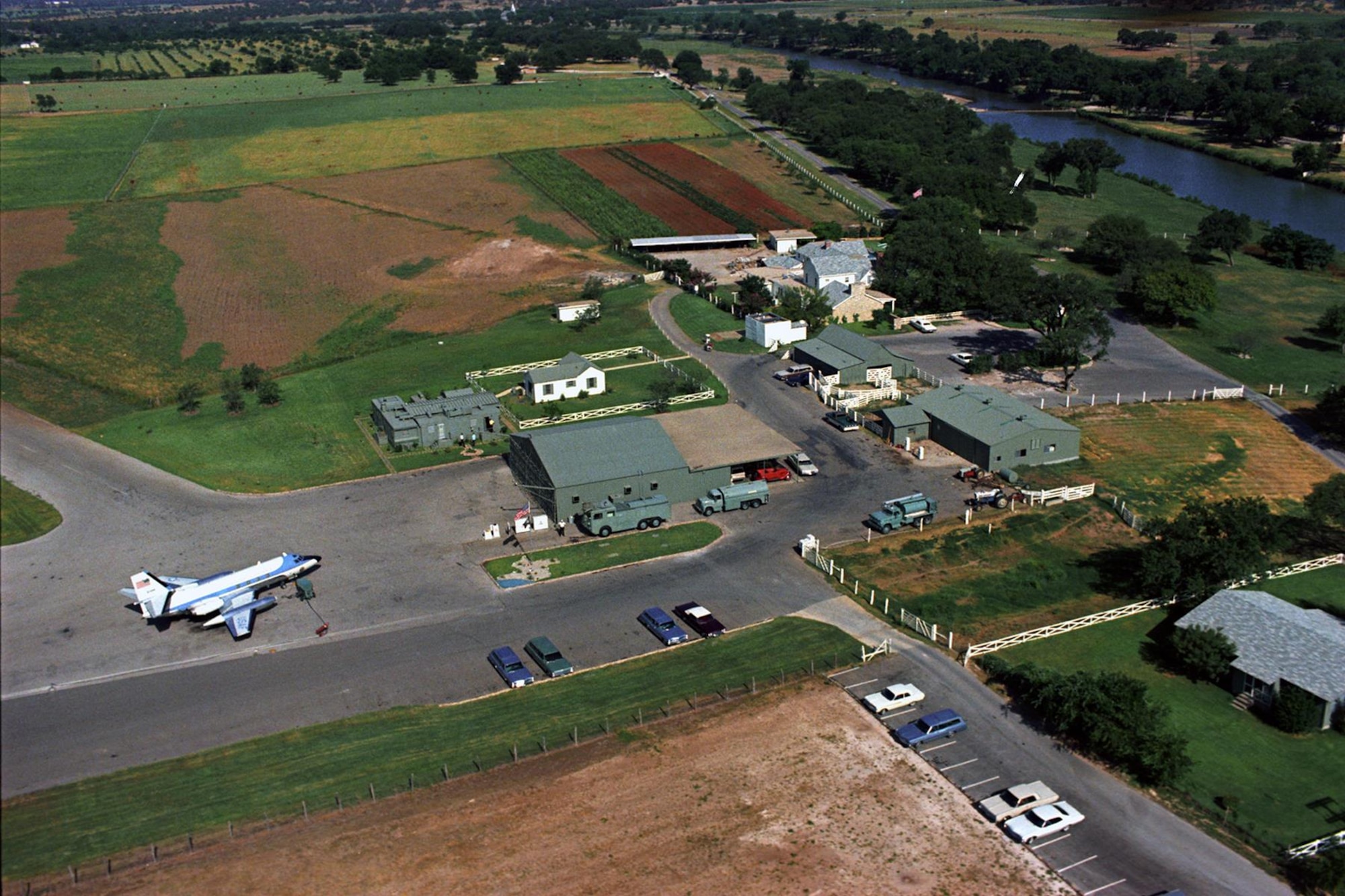 A U.S. Air Force VC-140B waits on the tarmac at President Lyndon B. Johnson’s family ranch near Stonewall, Texas, in June 1967. (U.S. Air Force photo)