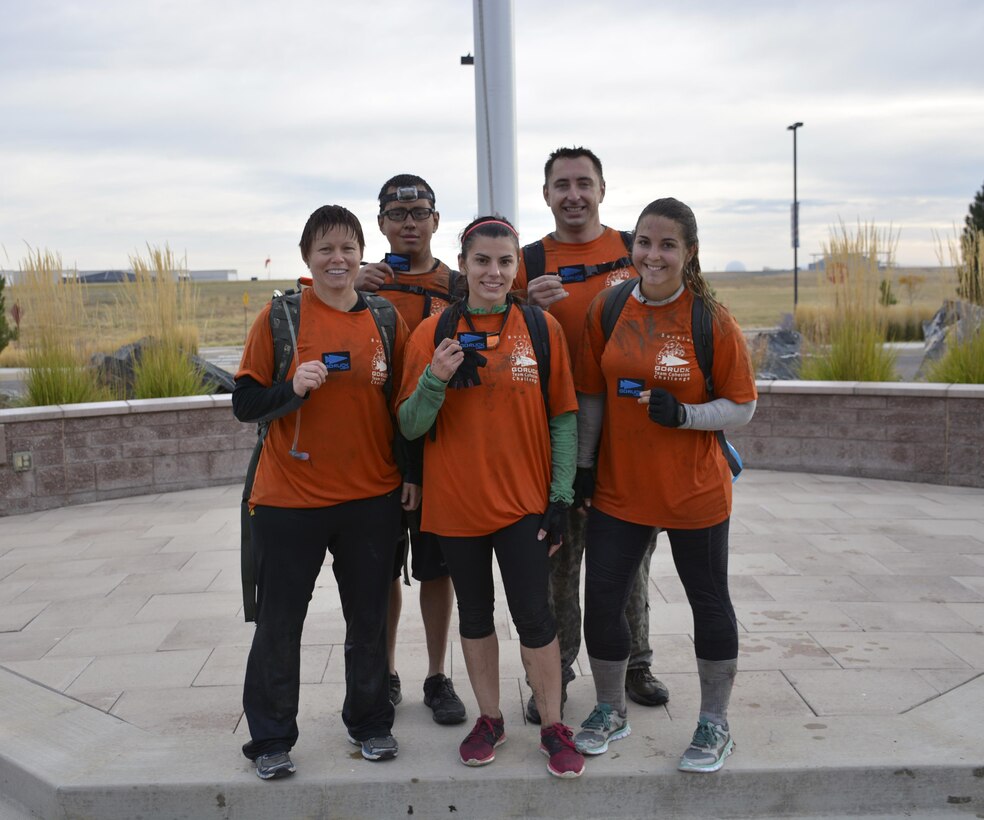 Service members from the Air Reserve Personnel Center participated in a GORUCK Light Challenge Sept. 30, 2015, on Buckley Air Force Base, Colo. ARPC members who participated were: Tech. Sgt. Julia Benson, ARPC assistant personnel systems manager, Tech. Sgt. Carola Todd, ARPC evaluation reports appeal board NCO in charge, Staff Sgt. Christina Sullivan, ARPC retirement services technician, Senior Airmen Aleksey Lazarev, ARPC Guard separation technician, and Senior Airman Jaen Munguia, ARPC evaluation technician. (U.S. Air Force courtesy photo/Master Sgt. Richard Grybos)