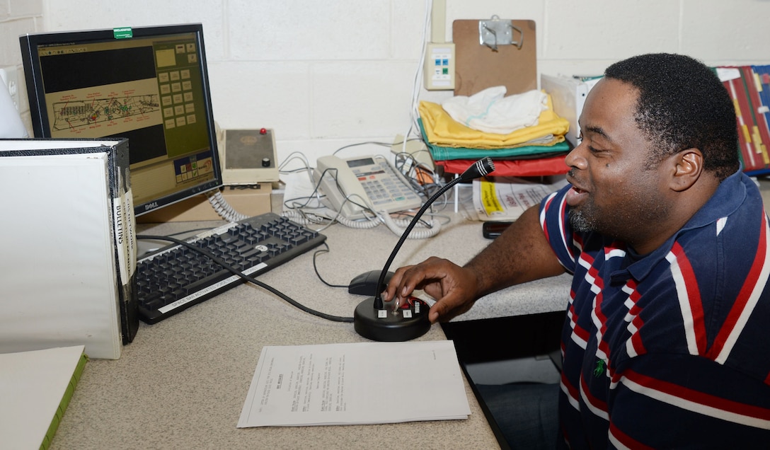 Jimmy Moody, emergency dispatcher, Marine Corps Police Department, Marine Corps Logistics Base Albany, sounds the mass notification system alerting base personnel, residents and visitors to the installation of the onset and conclusion of a shelter-in-place drill, Sept 30.  Emergency Operations Center officials at MCLB Albany held the drill in support of America’s 2015 PrepareAthon.


