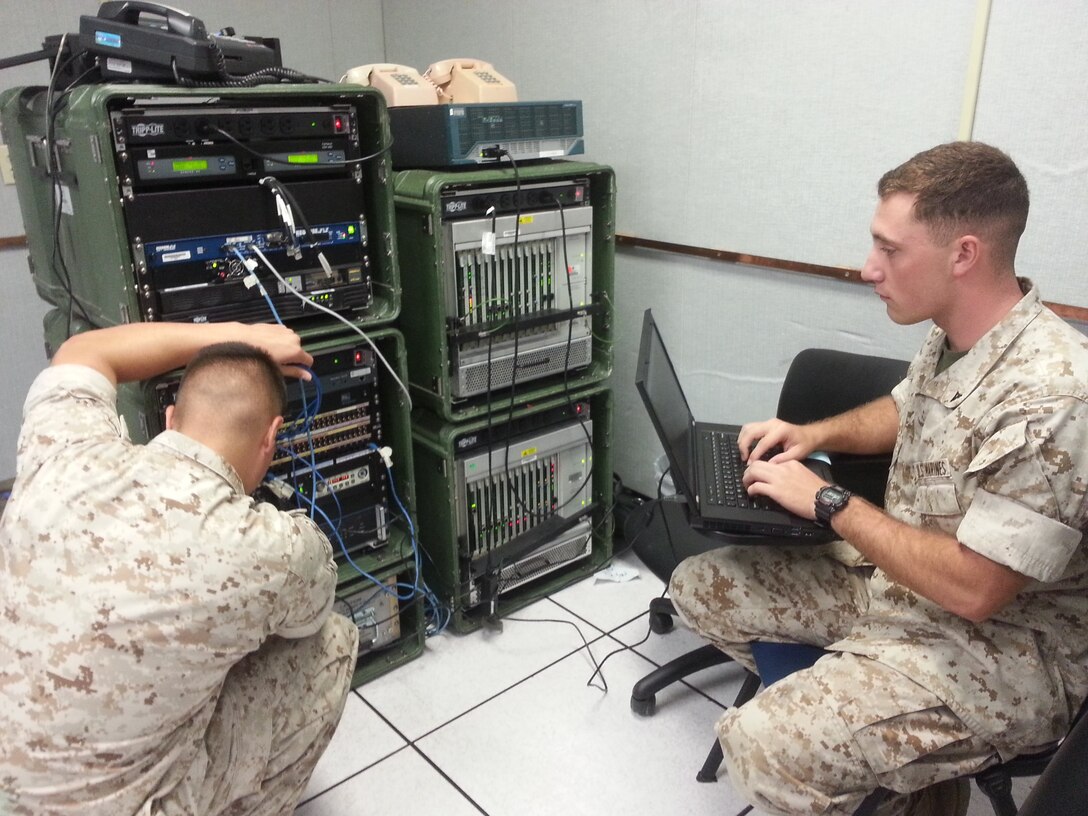 LCpl’s Bresson, Michael R. and Rodriguez, Roberto I. troubleshoot a DITS package during the troubleshooting phase of Technical Controllers Course class 2015040. Troubleshooting is the final annex of the course used to prepare the Marines to remedy problems for the FMF.