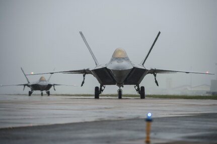 F-22 Raptors taxi down the runway at Langley Air Force Base, Va., Oct. 1, 2015. Due to projected tidal surges and potential flooding caused by Hurricane Joaquin, Langley evacuated approximately 40 aircraft from the 1st and 192nd Fighter Wings. (U.S. Air Force photo by Senior Airman Kayla Newman/Released)
