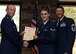 Airman 1st Class Randahl Jenson from the 49th Wing is presented with a promotion certificate during the September Enlisted Promotion Ceremony at Holloman Air Force Base, N.M. on Sept. 30. At the end of each month, members of Holloman get together to congratulate those who were promoted in that month. (U.S. Air Force photo by Staff Sgt. E’Lysia A. Wray)