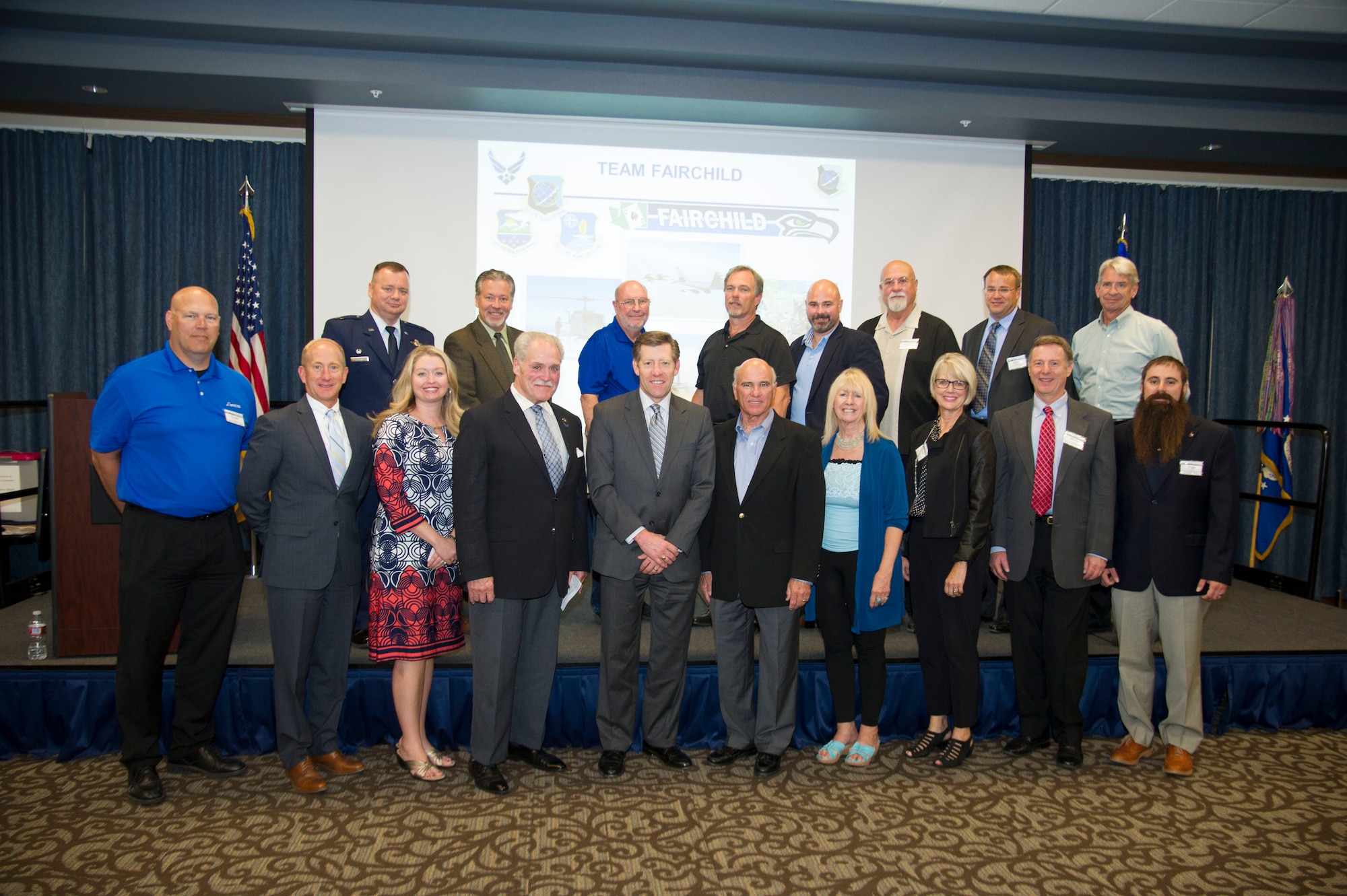 Col. Brian McDaniel, 92nd Air Refueling Wing commander, and Col. Matthew Fritz, 92nd ARW vice commander, pose for a picture with Fairchild's honorary commanders Sept. 29, 2015, at Fairchild Air Force Base, Wash. The honorary commanders program gives local civic leaders a look at Fairchild's diverse mission. (U.S. Air Force photo/Airman 1st Class Nick J. Daniello)