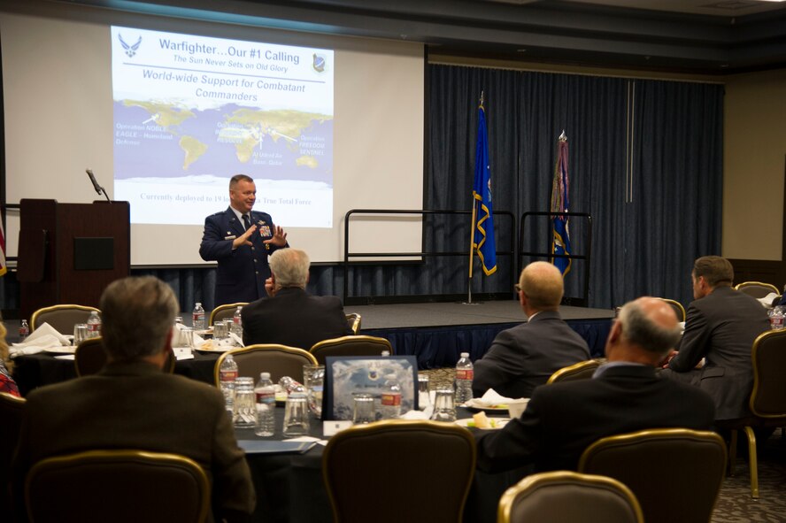 Col. Brian McDaniel, 92nd Air Refueling Wing commander, gives a mission brief to honorary commanders Sept. 29, 2015, at Fairchild Air Force Base, Wash. The honorary commanders program gives civic leaders a glimpse into the day-to-day operations of military life and Fairchild's mission. (U.S. Air Force photo/Airman 1st Class Nick J. Daniello)