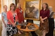 Pictured left to right are AEDC Woman’s Club  members Kelly Doyle, Karen Todaro, Suzie Schultz, and speaker and artist Tracy H. Sugg with her sculpture and Hudson River School style oil painting at the AEDCWC meeting Sept. 1 at the Arnold Lakeside Club. Sugg’s sculptures and bronze monuments can be viewed on her website www.tracyHsugg.com. (Photo provided)