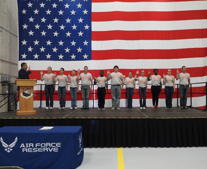 Col. Todd J. McCubbin, 934th Airlift Wing commander, administers the oath of enlistment to 11 Development and Training Flight Trainees Oct. 1. The trainees will return to the 934th Airlift Wing as Air Force Reservists after completing Basic Military Training at Lackland AFB, Texas. (Air Force Photo by Paul Zadach/Released)