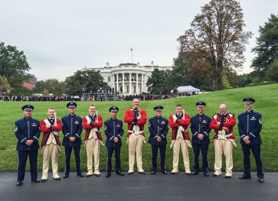 Percussionists from The United States Air Force Band and The United States Army Old Guard Fife and Drum Corps pose on the White House lawn prior to the arrival ceremony of Chinese President Xi Jinping. (U.S. Air Force photo/released)
