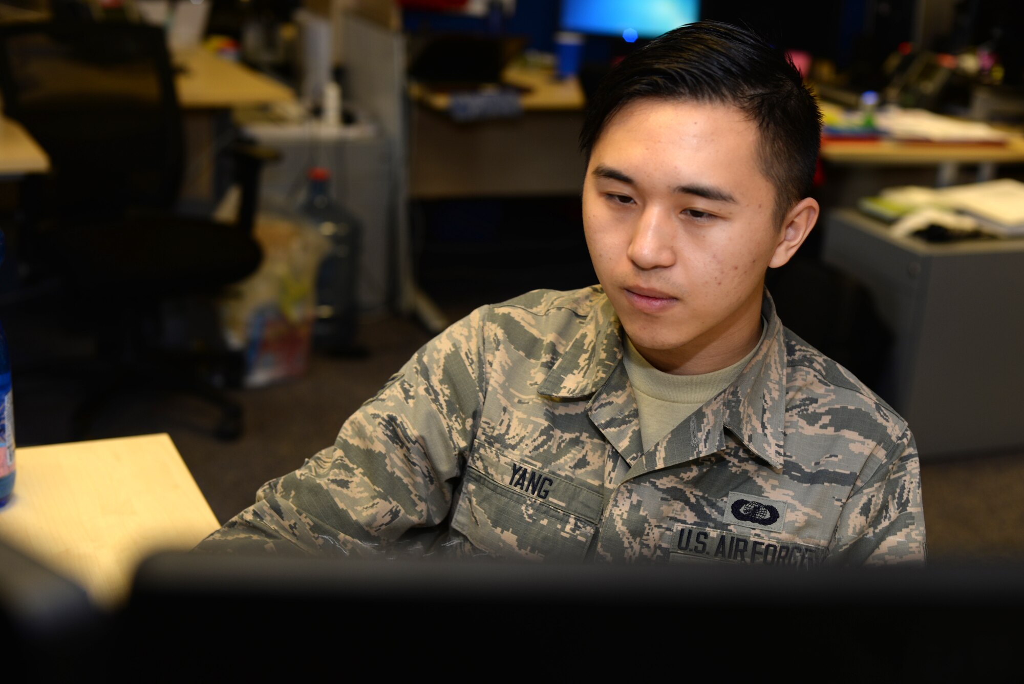 U.S. Air Force Senior Airman Leon Yang, 100th Comptroller Squadron budget analyst, reconsolidates vouchers to a spreadsheet Sept. 30, 2015, on RAF Mildenhall, England. Airmen from the 100th CPTS financial services team went through approximately 3,000 overseas housing allowance documents as part of a Secretary of the Air Force - directed audit.  Each year the Air Force receives funding for defense - related expenditures that must be allocated by Sept. 30. (U.S. Air Force photo by Senior Airman Christine Halan/Released)