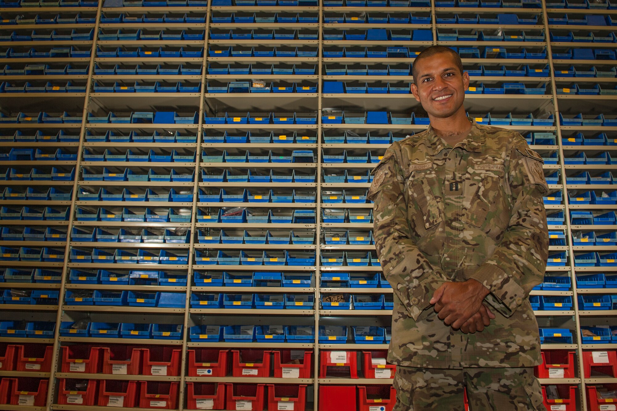 Capt. Javier Camacho, a Peruvian Air Force logistics officer, has been stationed at Little Rock Air Force Base, Ark., for approximately a year and a half. He is working alongside U.S. Airmen to learn how C-130 logistics operations are carried out at The Rock. (U.S. Air Force photo by Senior Airman Harry Brexel) 
