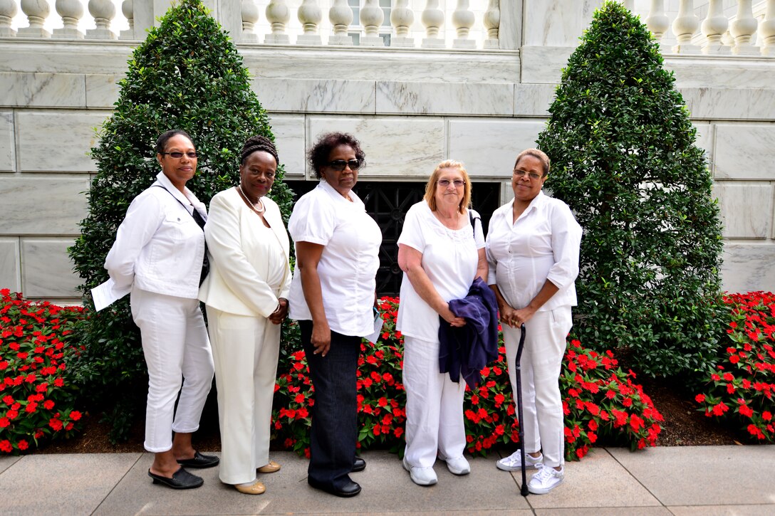 Hampton Roads, Va., Gold Star Mothers attend the  Gold Star Mother’s Day Observance at Arlington National Cemetery in Arlington, Va., Sept. 27, 2015.   The Fort Eustis Survivor Outreach Services, U.S. Army Training and Doctrine Command Center for Initial Military Training Chaplain and Naval Station Norfolk provided transportation for local mothers wishing to attend the event. (U.S. Air Force photo by Staff Sgt. Natasha Stannard/Released)