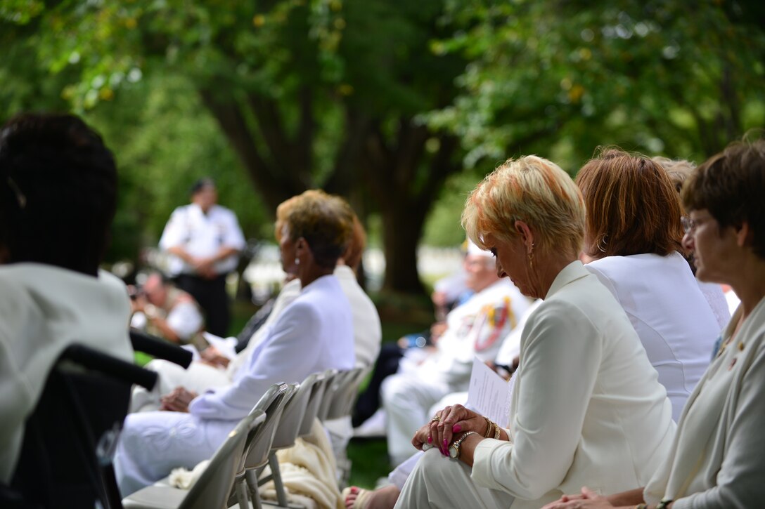 American Gold Star Mothers listen during the Gold Star Mother’s Day Observance at Arlington National Cemetery in Arlington, Va., Sept. 27, 2015. During the ceremony American Gold Star Mothers, Inc., representatives and U.S. Army Lt. Gen. David Halverson, Installation Management Command commander and assistant chief of staff, spoke of the importance of the support group as well as the legacy of their sons and daughters. (U.S. Air Force photo by Staff Sgt. Natasha Stannard/Released)
