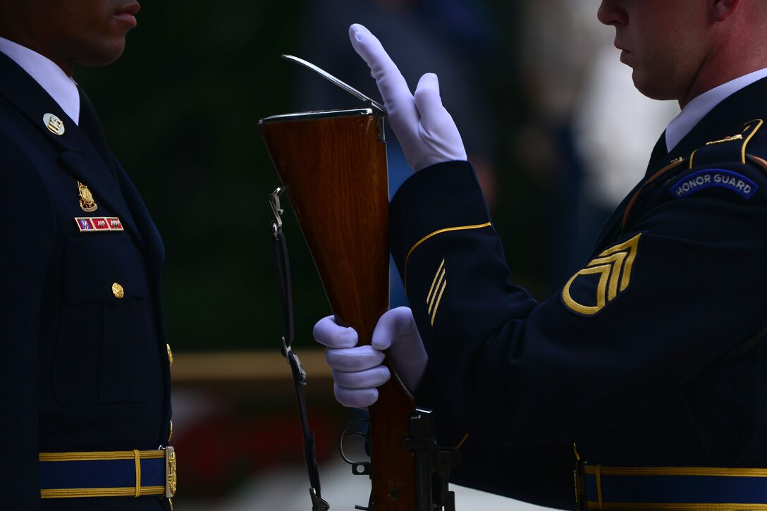 A U.S. Army 3rd U.S. Infantry Regiment (The Old Guard) relief commander inspects a guard rifle during the Gold Star Mother’s Day Observance at Arlington National Cemetery in Arlington, Va., Sept. 27, 2015. After the relief commander inspected the rifle, he walked to the center of the Tomb of the Unknown Soldier and announced the Changing of the Guard and the beginning of the observance. (U.S. Air Force photo by Staff Sgt. Natasha Stannard/Released)