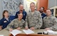 Col. Michael A. Vogel, 66th Air Base Group commander, and Hanscom Command Chief Master Sgt. Patricia Hickey sign the Hanscom Fitness and Sports Center's Statement of Understanding of Rules in the facility’s  lobby Sept. 30, while members of the 66th Force Support Squadron personnel look on. The fitness center officials announced that it will soon implement 24/7 fitness access to eligible users. Among those eligible include active duty military and their dependents, Defense Department civilians and National Guard and Reserve service members. (U.S. Air Force photo by Jerry Saslav)