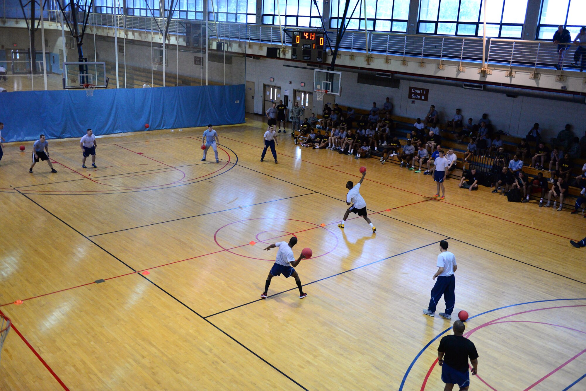 Members of Team Osan furiously compete for the title of dodgeball champions for their respective squadrons during the second annual Osan Cup held at Osan Air Base, Republic of Korea, Sept. 30, 2015. The Osan Cup is a two-day contest with a variety of events designed to play to different strengths and promote healthy competition.
(U.S. Air Force photo/Staff Sgt. Amber Grimm)