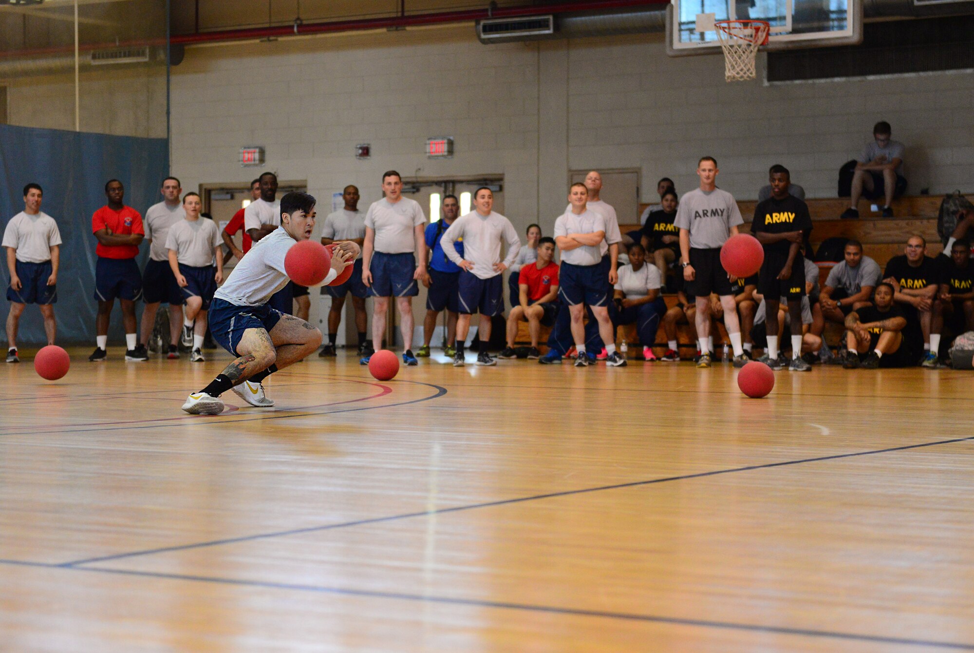 Battle rages as members of Team Osan furiously compete for the title of dodgeball champion during the second annual Osan Cup held at Osan Air Base, Republic of Korea, Sept. 30, 2015. The Osan Cup is a two-day contest with a variety of events designed to play to different strengths and promote healthy competition.
(U.S. Air Force photo/Staff Sgt. Amber Grimm)