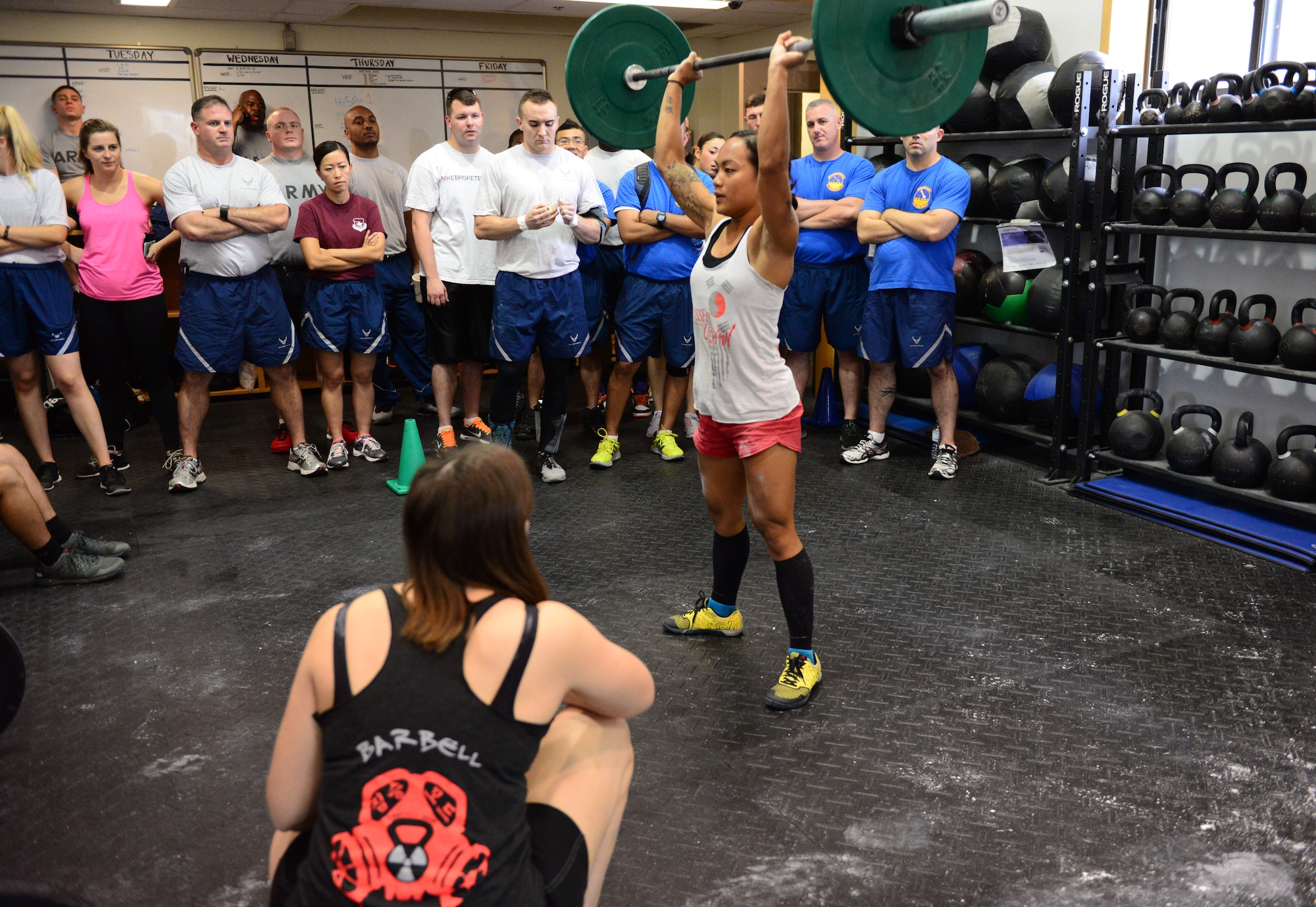Staff Sgt. Loriedana Ballesteros, 51st Operations Support Squadron commanders support staff member, is the center of attention as she competes in a timed, four-man group, high-intensity strength and conditioning challenge as part of the second annual Osan Cup held at Osan Air Base, Republic of Korea, Sept. 30, 2015. The Osan Cup is a two-day contest with a variety of events designed to play to different strengths and promote healthy competition.
(U.S. Air Force photo/Staff Sgt. Amber Grimm)