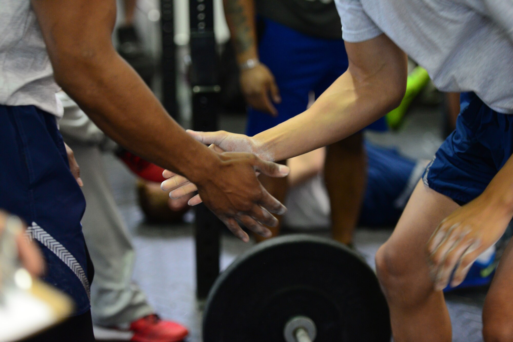 Team mates tag in and out as they compete in a timed, four-man group, high-intensity strength and conditioning challenge held at Osan Air Base, Republic of Korea, Sept. 30, 2015. The Osan cup is a sport-oriented, two-day event that puts squadrons and service members against each other in a battle royal to show who has the most skill, strength and knowledge. 
(U.S. Air Force photo/Staff Sgt. Amber Grimm)