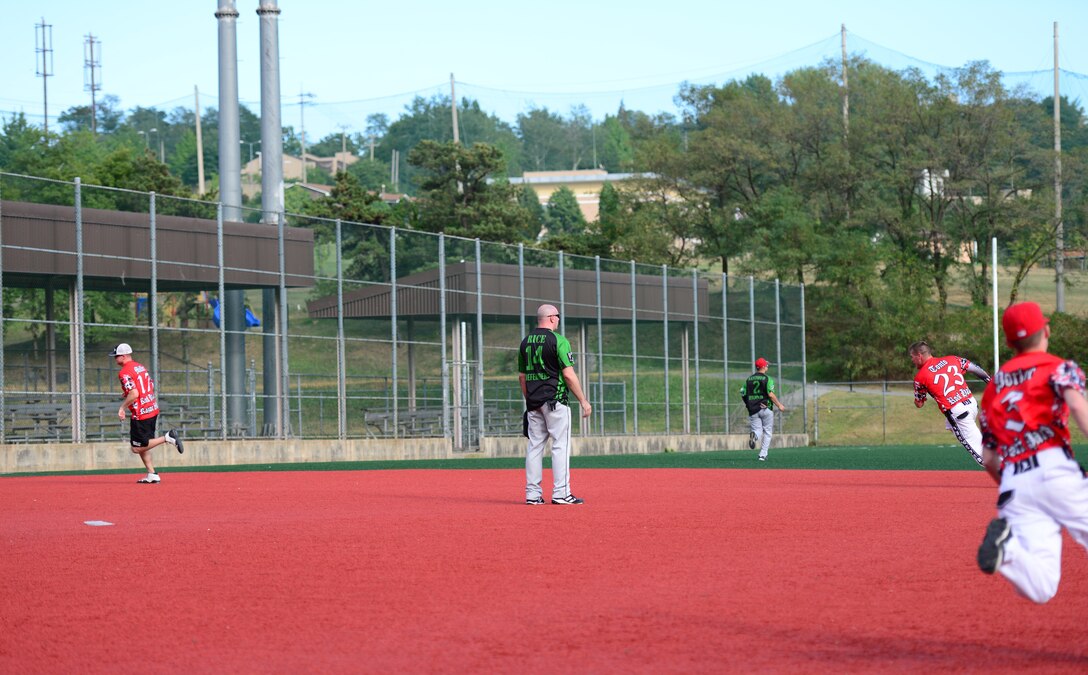 Soldiers from the 35th Air Defense Artillery Brigade run the bases in their first softball game against the 51st Security Forces Squadron at Osan Air Base, Republic of Korea, Sept. 29, 2015. Softball was just one of the events Airmen and Soldiers competed in during the second annual Osan Cup.
(U.S. Air Force photo/Staff Sgt. Amber Grimm)