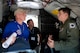 David Engel, left, son of World War ll veteran Russ Engel, speaks with U.S. Air Force Capt. Brian Dunn, 351st Air Refueling Squadron instructor pilot, while touring a static display Sept. 24, 2015, at Louis Armstrong New Orleans International Airport in New Orleans, La. The static display was just one of the visits planned for the 100th Bomb Group Foundation reunion which has been held for more than 40 years. (U.S. Air Force photo by Senior Airman Victoria H. Taylor/Released)