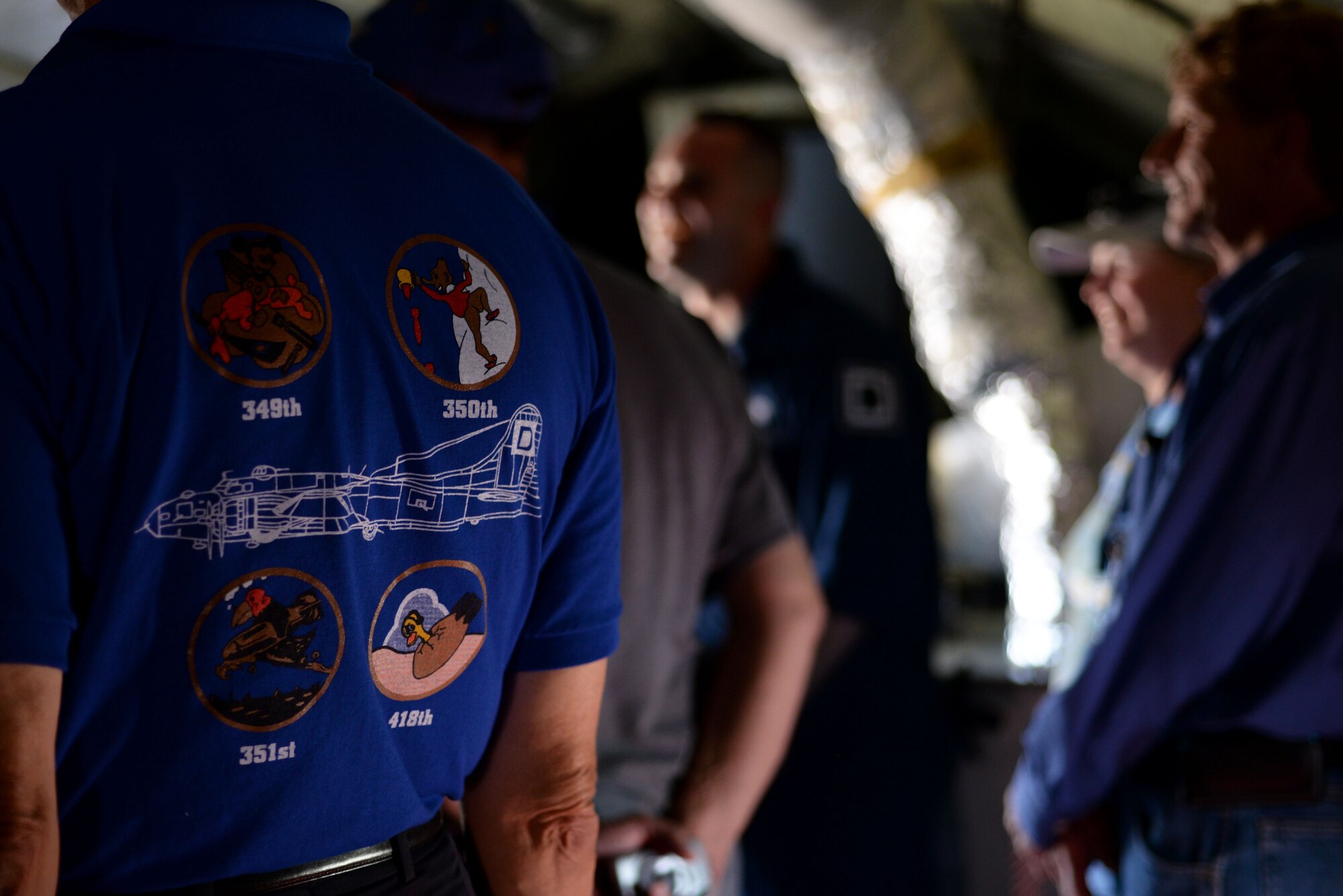 Guests from the 100th Bomb Group Foundation reunion listen as U.S. Air Force Staff Sgt. Michael Faux, 100th Aircraft Maintenance Squadron KC-135 Stratotanker flying crew chief, speaks about his job Sept. 24, 2015, at Louis Armstrong New Orleans International Airport in New Orleans, La. The static display was just one of the visits planned for the 100th Bomb Group Foundation reunion which has been held for more than 40 years. (U.S. Air Force photo by Senior Airman Victoria H. Taylor/Released)